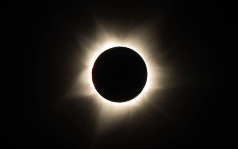 Flying in an eclipse
