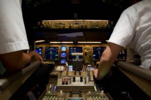 pilots in the flight deck