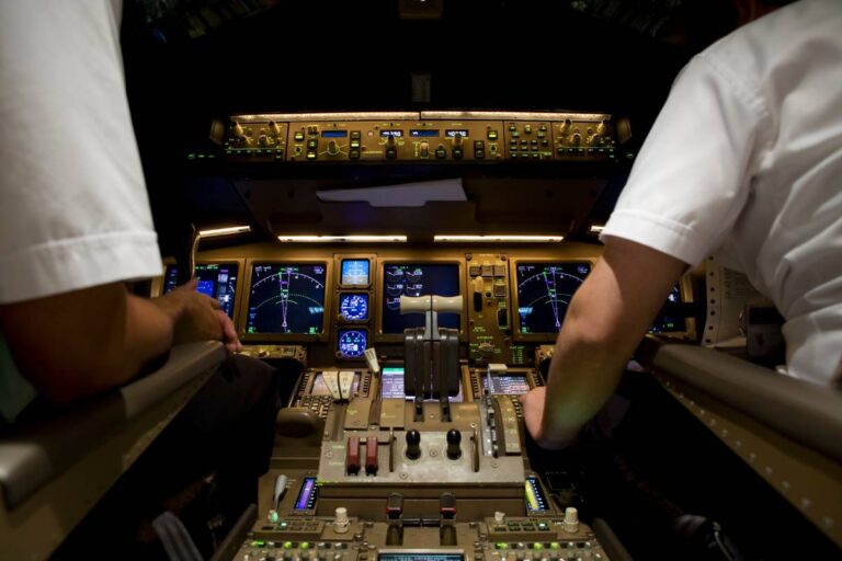 pilots in the flight deck